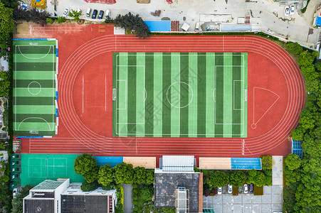 学校鸟瞰图俯拍学校足球场背景