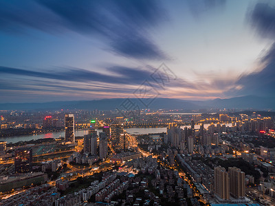 云层城市夕阳下的福州闽江岸背景