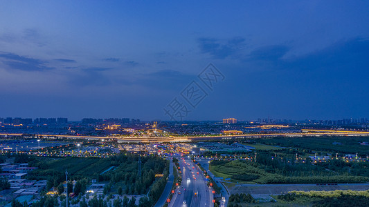 公路夜航拍正定古城夜景背景