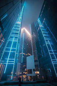 蓝紫色科技线条青岛CBD高楼夜景亮化背景