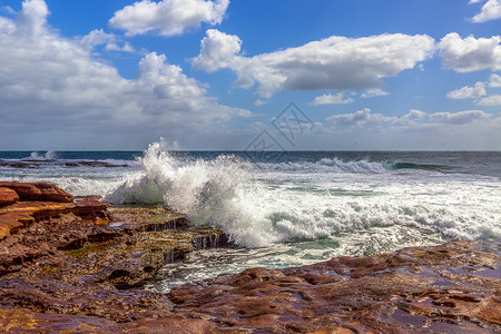 蓝色动感波浪澳大利亚海岸独特地貌风光美景背景