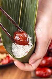 端午节蜜枣包粽子背景图片