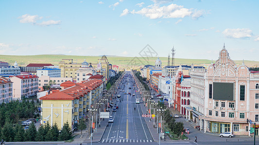 夏天黑龙江省大兴安岭漠河县城街道上的俄罗斯风格建筑背景