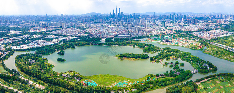 郑州人民公园航拍全景海珠湖公园城市建筑群背景