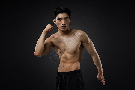 运动男性肌肉展示健壮高清图片素材