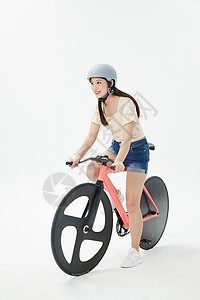 骑独轮美女骑自行车低碳出行背景