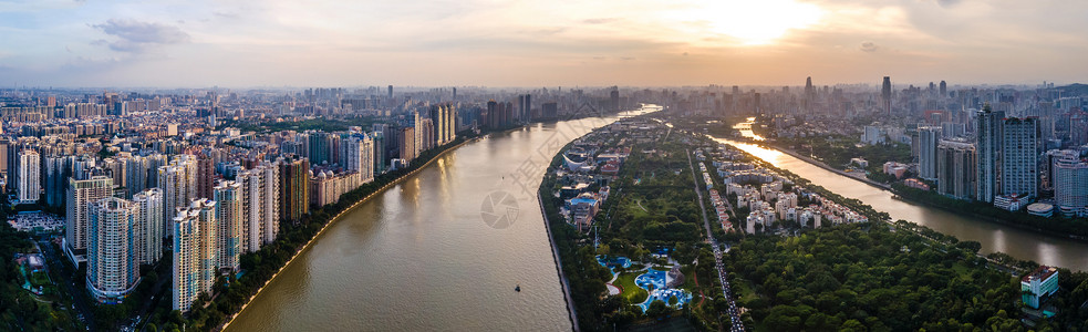 航拍广州二沙岛城市建筑群傍晚夕阳图片