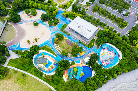 游乐公园俯拍小区里的儿童乐园背景