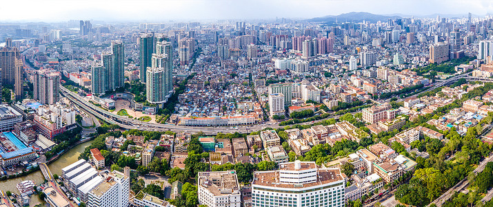 广州荔湾区全景航拍广州沙面公园荔湾区城市建筑背景