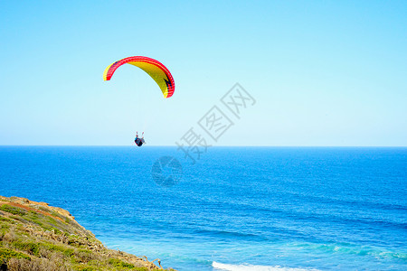大海桌面素材海边滑翔伞背景
