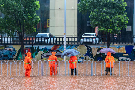 应急救灾暴雨洪水抢险救灾的工作人员背景