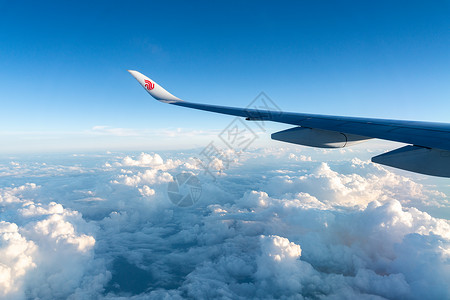 机舱窗口飞机机舱外景色背景