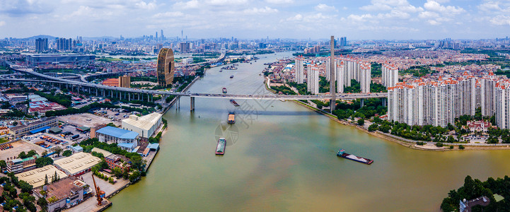 航拍广州东沙大桥城市建筑背景图片