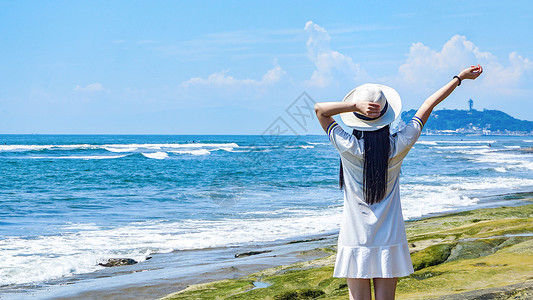 小清新帽子镰仓海边女孩背影背景