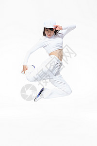 街舞女生跳跃动作背景图片