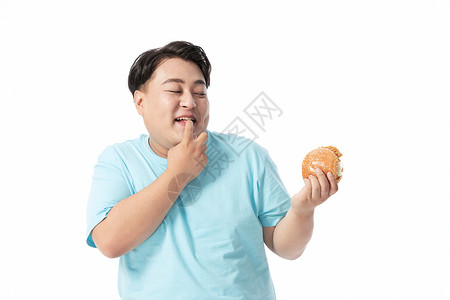 肥胖男士犹豫要不要吃汉堡图片