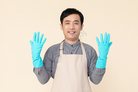 佩戴手套的的男性家政服务图片