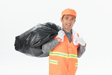 背垃圾袋的环卫工人背景图片