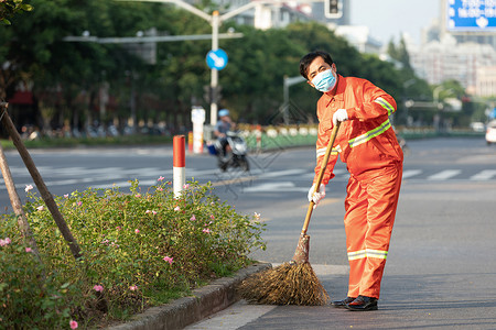 扫地的人打扫马路街道的环卫工人背景