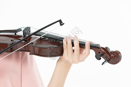 音乐老师老师教青少年学生拉小提琴背景