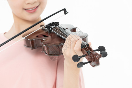 青少年学生学习拉小提琴高清图片