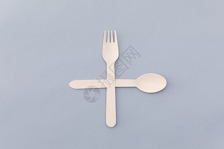 一次性餐具创意木制叉勺组合静物背景