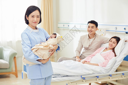高档月子中心护工抱着婴儿月嫂高清图片素材