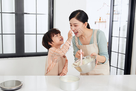 母子做饭母子烘培和面粉制作蛋糕背景