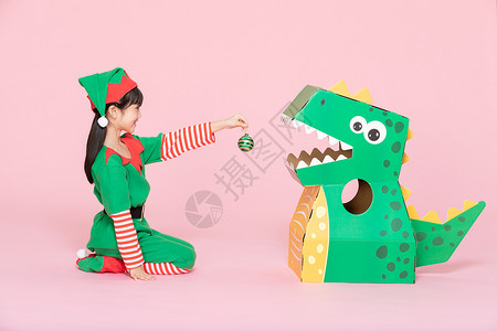 卡通恐龙玩具儿童小女孩欢乐过圣诞背景