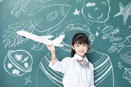 女孩幻想儿童小女孩手拿飞机航天梦想背景