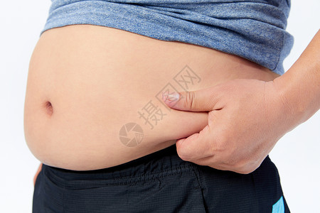 中年肥胖肥胖男性捏肚子特写背景