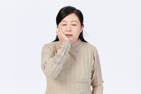中年女性牙龈疼痛背景图片