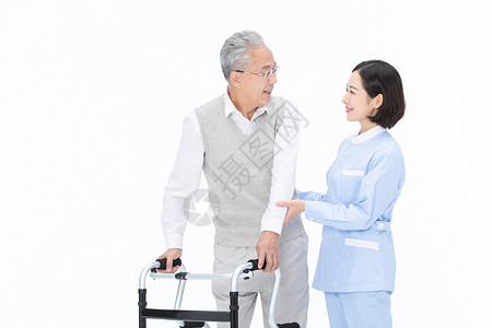 护士搀扶老人散步行动不便的人照顾高清图片素材