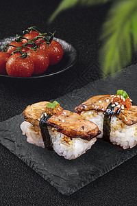 黑色的鹅肝寿司单品背景图片
