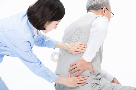 护士帮老人按摩腰部高清图片