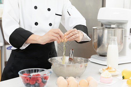 食物美女面点师制作面点打鸡蛋特写背景