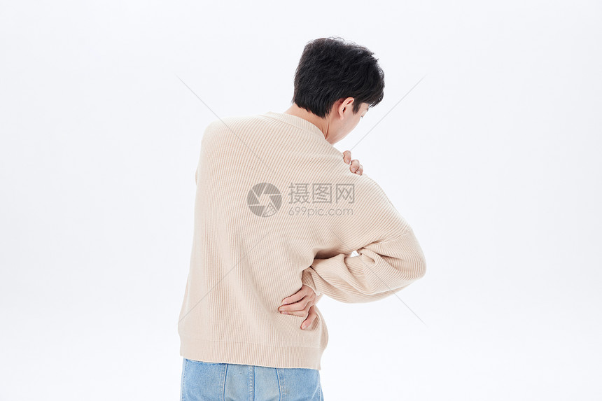 肩膀酸痛的青年男性图片