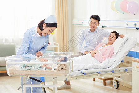 高档月子中心护工照顾婴儿医院高清图片素材
