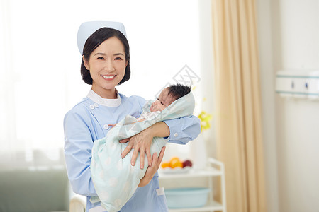 高档月子中心护工抱着婴儿形象背景