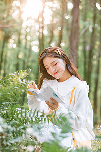 森系美女公园阅读学习背景图片