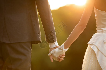 婚礼浪漫素材夕阳下的浪漫婚纱照特写背景