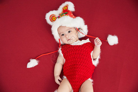 可爱新年新年装扮的可爱婴儿背景