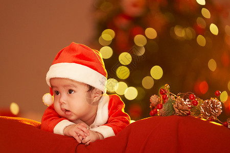 婴儿服圣诞节穿圣诞服的可爱婴儿背景