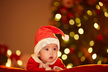 圣诞兔女郎写真圣诞节穿圣诞服的可爱婴儿背景