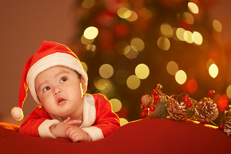 婴儿服圣诞节穿圣诞服的可爱婴儿背景