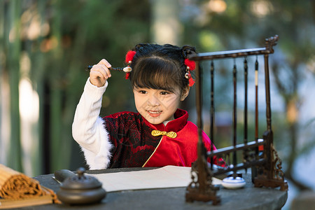 欢乐童年毛笔字中国风小女孩公园里写书法毛笔字背景