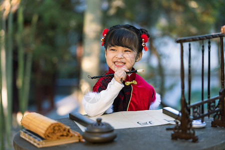 唐装汉服中国风小女孩公园里写书法毛笔字背景