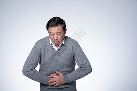 肠道免疫捂着肚子腹部疼痛的男性背景