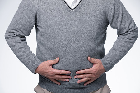 肠道微生物捂着肚子腹部疼痛的男性背景