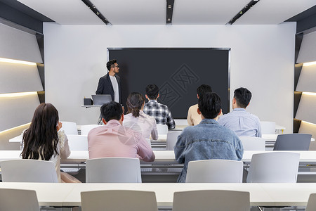 成人教学成人教育课堂学生听老师讲课背景